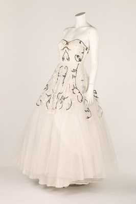 Lot 81 - Two prom style dresses, 1950s, one black with...