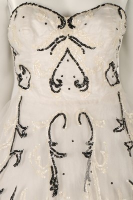 Lot 81 - Two prom style dresses, 1950s, one black with...
