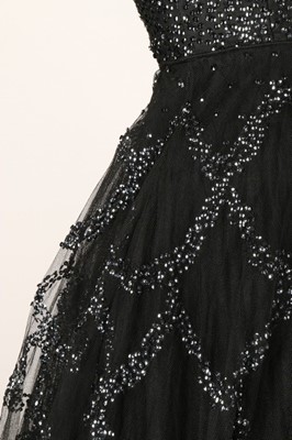 Lot 81 - Two prom style dresses, 1950s, one black with...