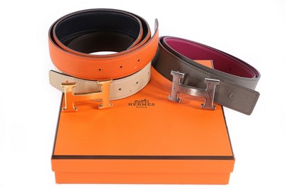 Lot 154 - Three Hermès reversible leather belts, modern,...