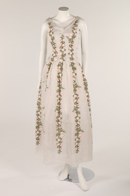 Lot 93 - A white organza dress embroidered with wild...