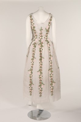 Lot 93 - A white organza dress embroidered with wild...