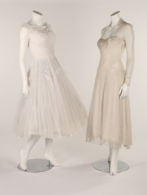 Lot 93 - A white organza dress embroidered with wild...