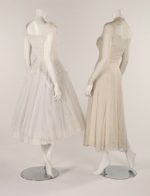 Lot 93 - A white organza dress embroidered with wild...