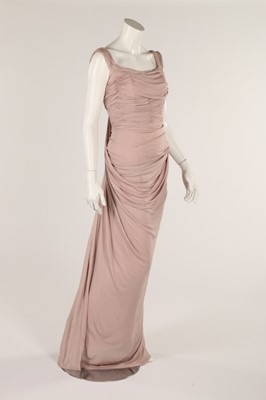 Lot 94 - A pale pink jersey gown, circa 1956-8,...