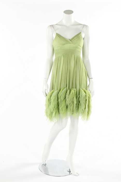 Lot 108 - Two lime green chiffon cocktail dresses, 1960s,...