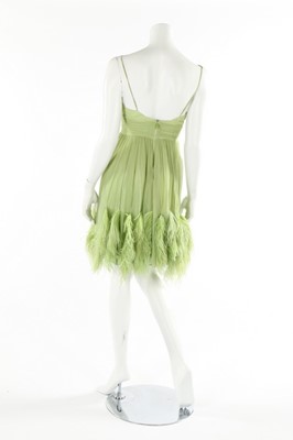 Lot 108 - Two lime green chiffon cocktail dresses, 1960s,...