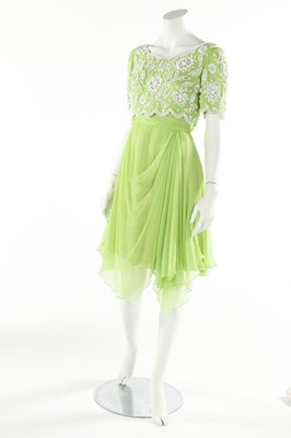 Lot 108 - Two lime green chiffon cocktail dresses, 1960s,...