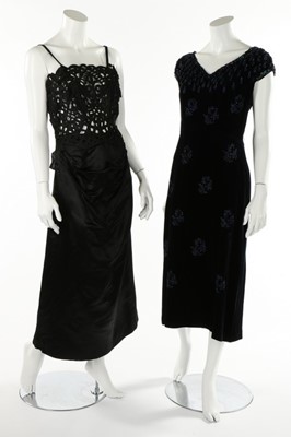 Lot 110 - A black satin evening dress made from a...