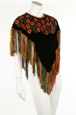 Lot 128 - A green velvet embroidered Guatemalan poncho,...