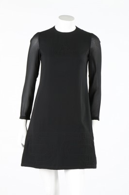 Lot 134 - A Pierre Cardin black silk crepe mini-dress,...