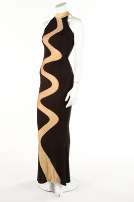 Lot 158 - Two glam evening dresses, 1970s, one decorated...