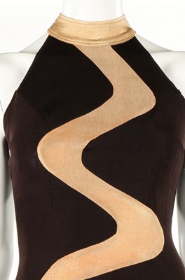 Lot 158 - Two glam evening dresses, 1970s, one decorated...