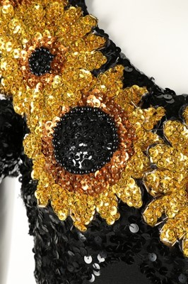 Lot 158 - Two glam evening dresses, 1970s, one decorated...