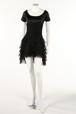 Lot 193 - A Chanel boutique black cocktail dress,...