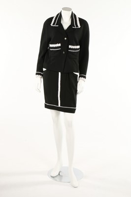 Lot 194 - A Chanel boutique black suit, labelled, both...