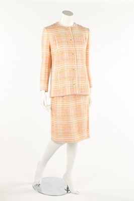 Lot 195 - A Chanel Creations pastel wool suit, 1980s,...