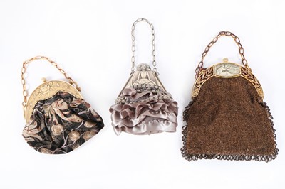 Lot 52 - Three handbags with celluloid frames, 1920s,...