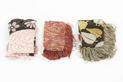 Lot 253 - A gold lamé and leaf-print stole, late 1920s,...