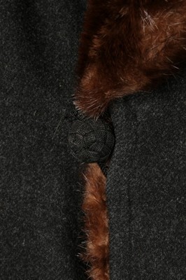 Lot 9 - A mink lined dark grey wool man's coat, 1920s,...