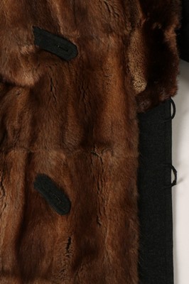 Lot 9 - A mink lined dark grey wool man's coat, 1920s,...