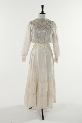 Lot 300 - A silk dress with Chinese embroidered bodice,...