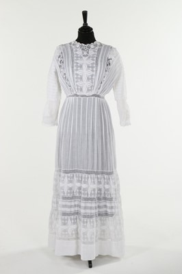 Lot 301 - A day dress, circa 1914, of white cotton, the...