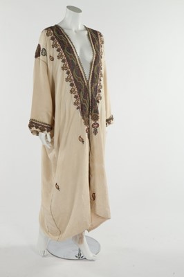 Lot 329 - An Ottoman embroidered cream silk kaftan,...