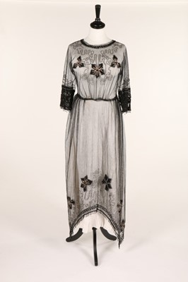 Lot 12 - An embroidered tulle dress, circa 1918,...