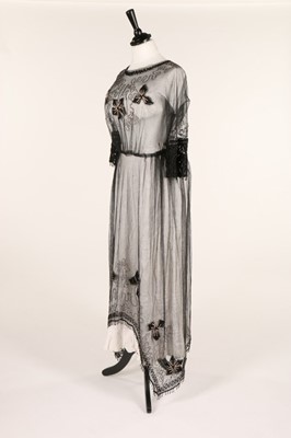 Lot 12 - An embroidered tulle dress, circa 1918,...