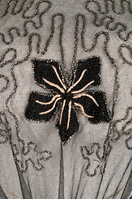 Lot 12 - An embroidered tulle dress, circa 1918,...