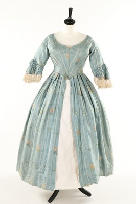 Lot 354 - A striped pale blue silk open robe, 1770s but...