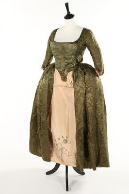 Lot 356 - A sage-green damask satin open robe, late...