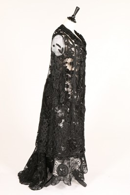 Lot 14 - A black tapelace and tulle coat, circa 1910,...