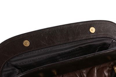 Lot 146 - A Prada brown ruched Nappa leather holdall,...