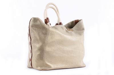 Lot 146 - A Prada brown ruched Nappa leather holdall,...