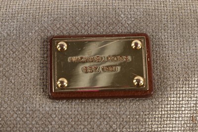 Lot 146 - A Prada brown ruched Nappa leather holdall,...