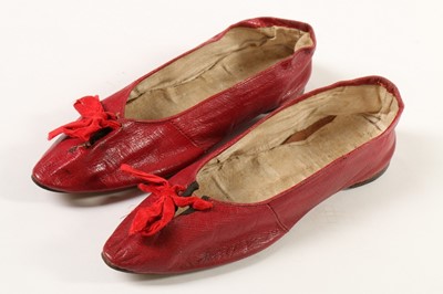 Lot 359 - A pair of women's red morocco leather pumps,...