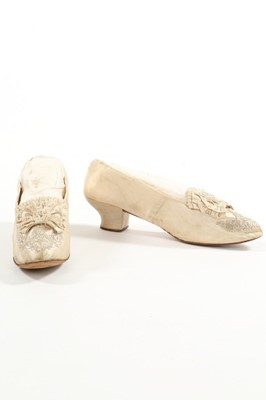 Lot 362 - A group of ivory dance/bridal shoes, 1830-1880,...