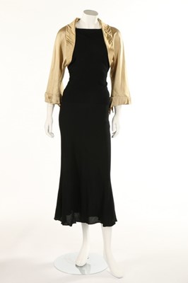 Lot 375 - A group of 1930s evening wear, six dresses and...