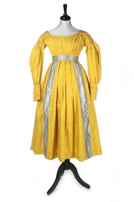 Lot 72 - A group of antique dresses, including woven...