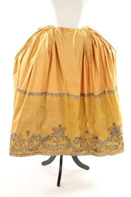 Lot 392 - An embroidered mustard silk petticoat border,...