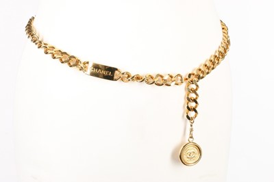 Lot 416 - A Chanel gilt chain belt, 1980s, with 'Chanel'...