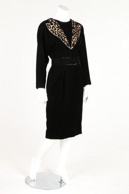 Lot 222 - A Christian Dior sequined black velvet...