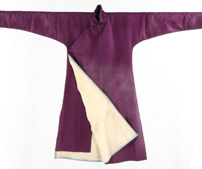 Lot 490 - A purple damask woman's winter robe, Chinese...