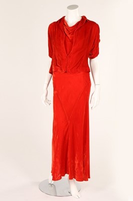 Lot 28 - A burnt orange velvet evening gown and bolero,...