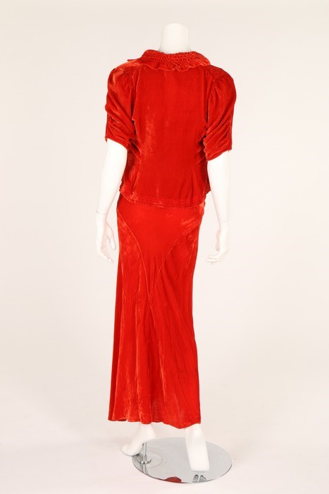 Lot 28 - A burnt orange velvet evening gown and bolero,