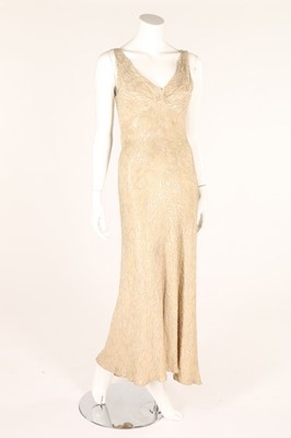 Lot 29 - A group of black and gold eveningwear, 1930s,...