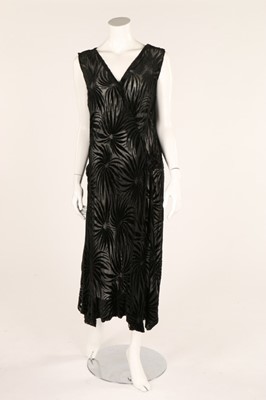 Lot 41 - A black cut-velvet evening dress, 1930s,...