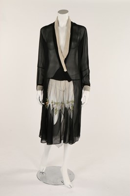 Lot 47 - A black chiffon dress, late 1920s, inset with...